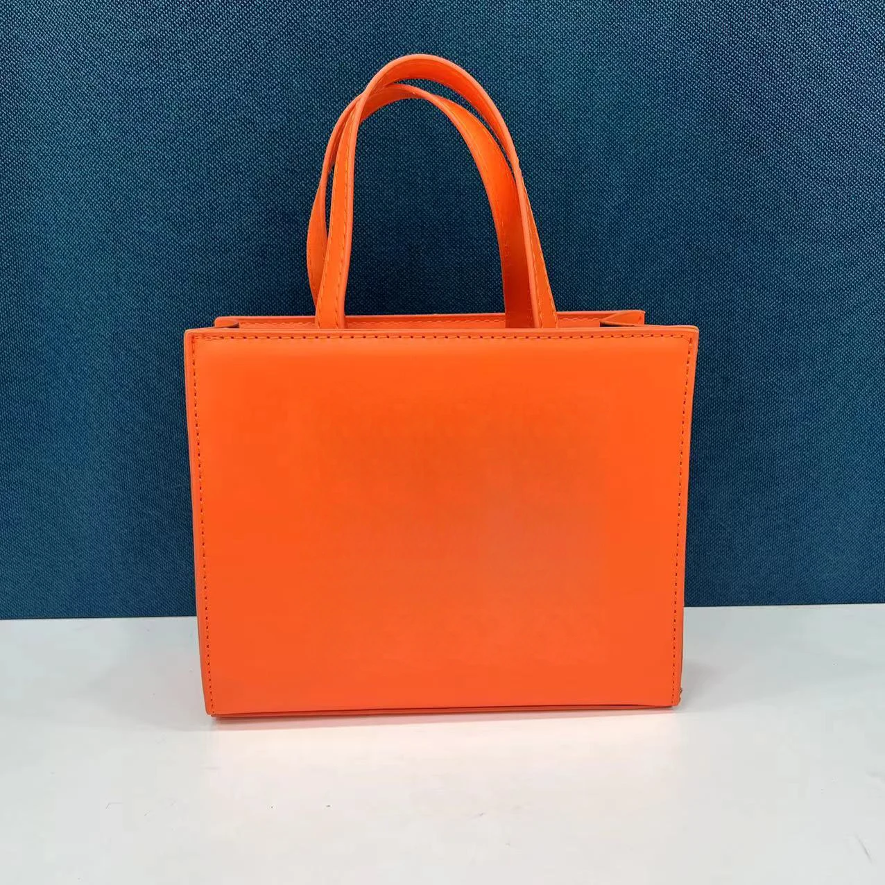 H51956577ef0e4cfa82cad0b7b9215c05g.webp European and American Trendy Women's Tote Bag Custom logo Outdoor Shopping Working PU Handbag - Orange, customization - Image 1